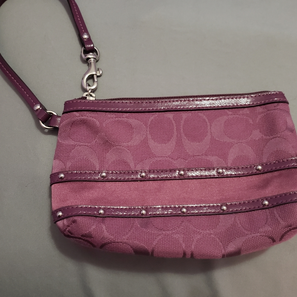Coach plum wristlet